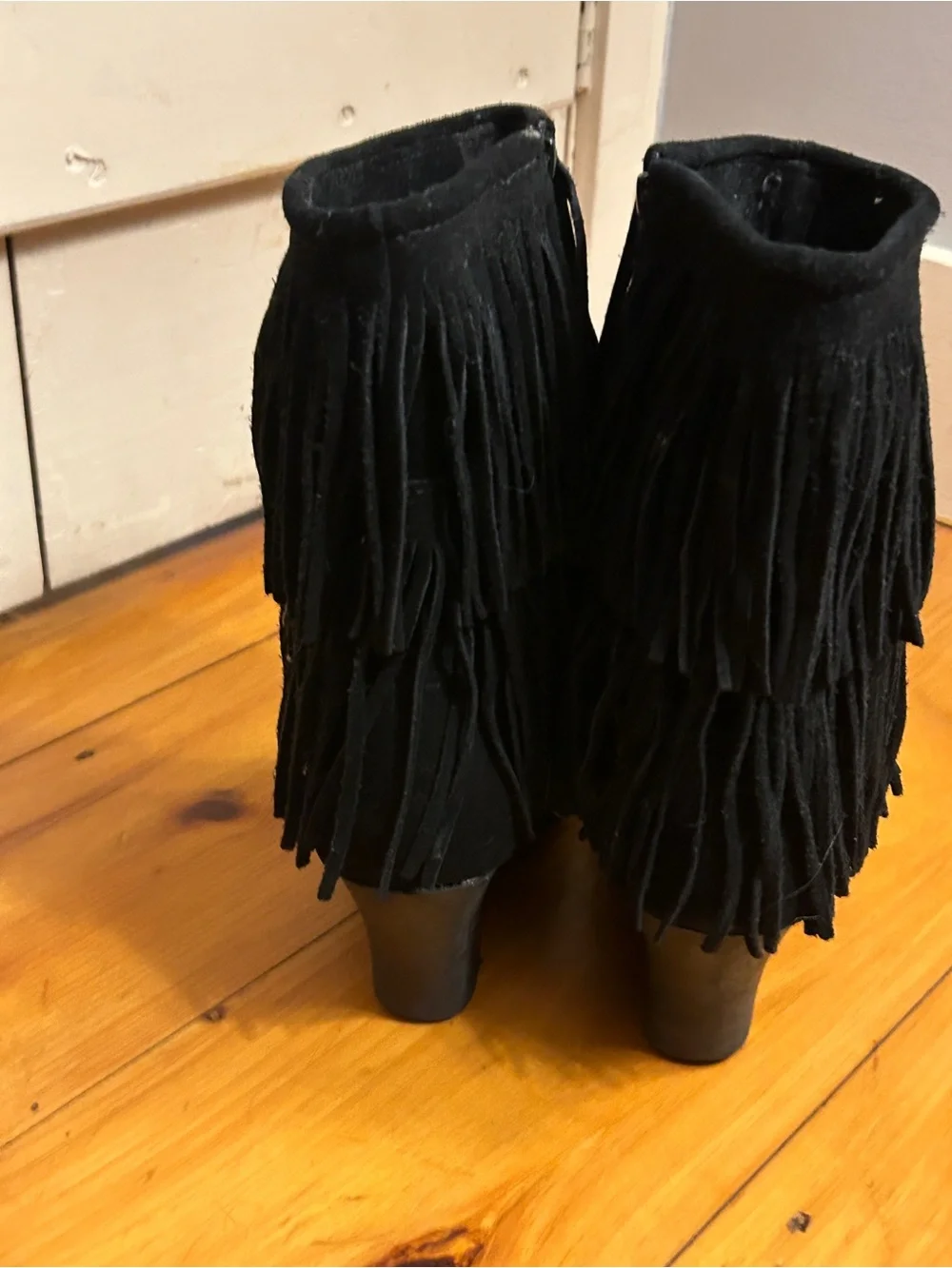 Minnetonka Black Suede Fringe Wedge Boots